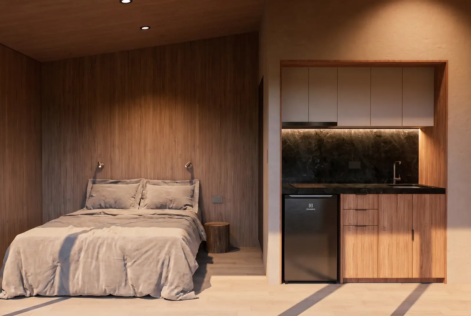 Dormitorio y kitchenette de la Cabana
